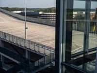 an empty parking lot next to the highway has been converted into a pedestrian walkway for pedestrians