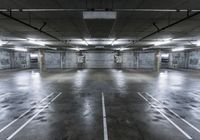 empty parking space with lights, parking spaces and concrete walls have been changed to give this photo look a much grungy feel