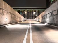 this image shows an empty parking space on the side of a bridge next to some buildings