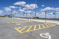 parking spaces painted yellow in a commercial area with no vehicles at all around them as well