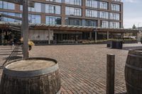 the sidewalk outside of an empty restaurant on a sunny day in the city of boston