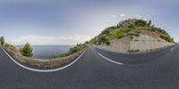 three point perspective images of an empty road and cliff above water below them with the ocean