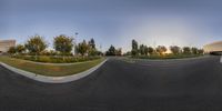 a fish eye lens view of an empty road and parking lot from a perspective point perspective