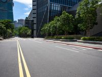 a view down an empty street with no cars on it in the city of london