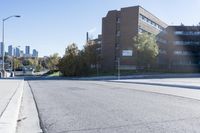 the road has been cut down and is empty for pedestrians to ride on it or leave