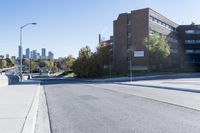 the road has been cut down and is empty for pedestrians to ride on it or leave