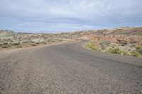 a view of an empty road with no traffic in it, which is very barren