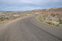 a view of an empty road with no traffic in it, which is very barren