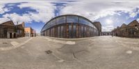 the 360 - view view of an empty street shows a fish shaped object in its centre