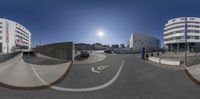 three fisheye images show an empty street in front of a building and a parking lot