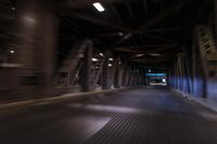 an empty street and a highway with a truck on it at night time with motion blur