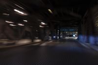 an empty street and a highway with a truck on it at night time with motion blur