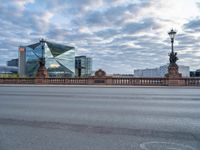 the street is empty next to the building near the water tower in berlin, germany