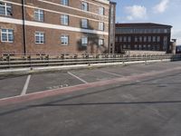 a street with no cars on it and two parking spaces on the side of it