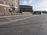 a street with no cars on it and two parking spaces on the side of it