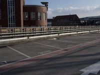 a street with no cars on it and two parking spaces on the side of it