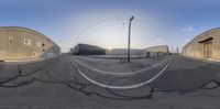 a 360 - angle photo of two empty street spaces, one empty and one empty