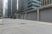 an empty street is seen in this photo taken from the outside of buildings and with no people