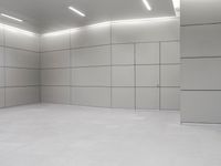 an empty floor is seen in this image and the flooring is all white and white