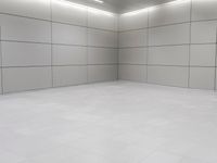 an empty floor is seen in this image and the flooring is all white and white