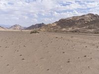 Endless Road in the African Desert: Sand Dunes and Mountains