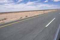 Endless Road in the Desert under a Clear Sky