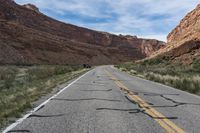 Endless Road through Red Rock Badlands