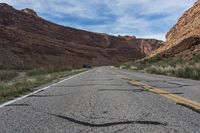 Endless Road through Red Rock Badlands