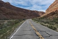 Endless Road through Red Rock Badlands