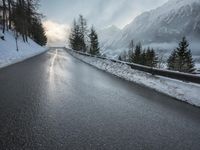 Endless Road in the Swiss Alps: Snow and Fog