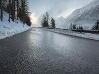 Endless Road through Swiss Alps in Snow and Fog