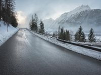 Endless Road through Swiss Alps in Snow and Fog