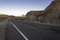 Endless Road through Utah's Red Rock at Dawn