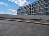 a car is driving on the highway through an underground parking garage area in a city