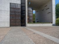 European Architectural Contrast: Concrete Walls and Clear Sky