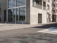 the sidewalk is empty and not in use for pedestrians to cross it or walk past the building