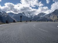 Highland Road in Europe with Trees and Clouds