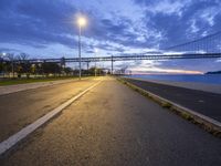 Europe's Portugal: A Coastal View of Lisbon's Bridge