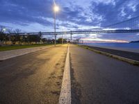 Europe's Portugal: A Coastal View of Lisbon's Bridge
