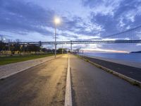 Europe's Portugal: A Coastal View of Lisbon's Bridge