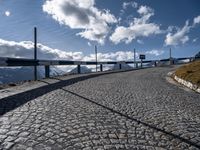 Europe's Rolling Hills: Navigating Nature on an Asphalt Road