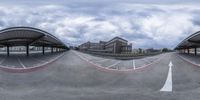 a street scene with three fish eye lens photographs of a street that has several buildings on it