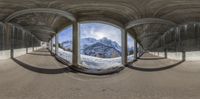 three panoramic shots of the outside of a snow covered mountain, a road is below