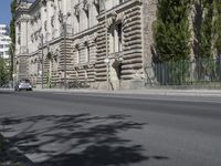 the street is empty of cars in the city of barcelona, spain, as well