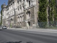 the street is empty of cars in the city of barcelona, spain, as well