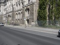 the street is empty of cars in the city of barcelona, spain, as well