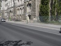 the street is empty of cars in the city of barcelona, spain, as well