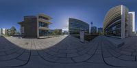 a 360 - view image taken of the outside of a building with two different buildings in front of it