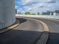 a car is driving on the highway through an underground parking garage area in a city