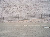 European City Life: Brick Wall in an Urban Public Space